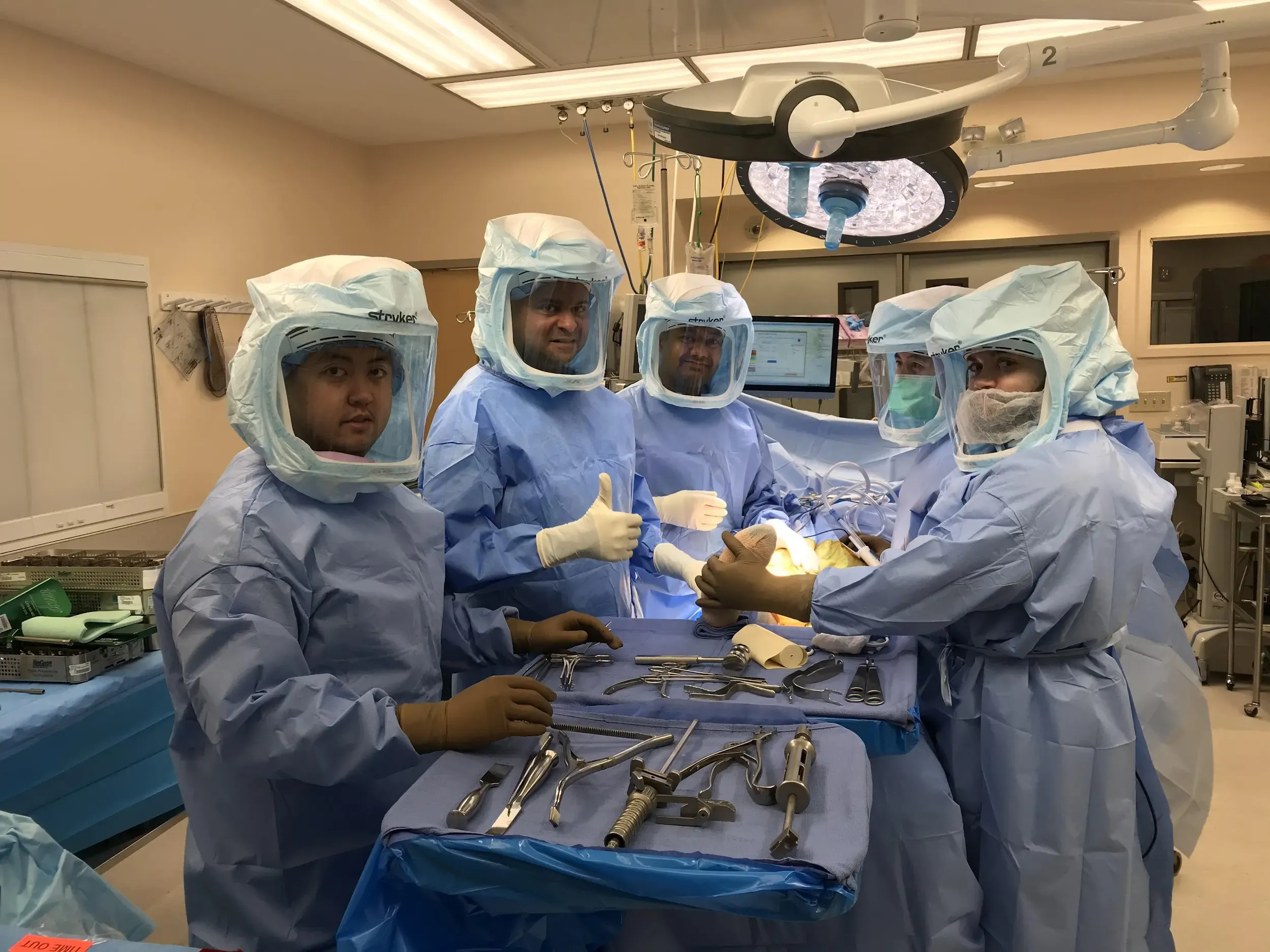 Doctors performing surgery Doctors performing surgery