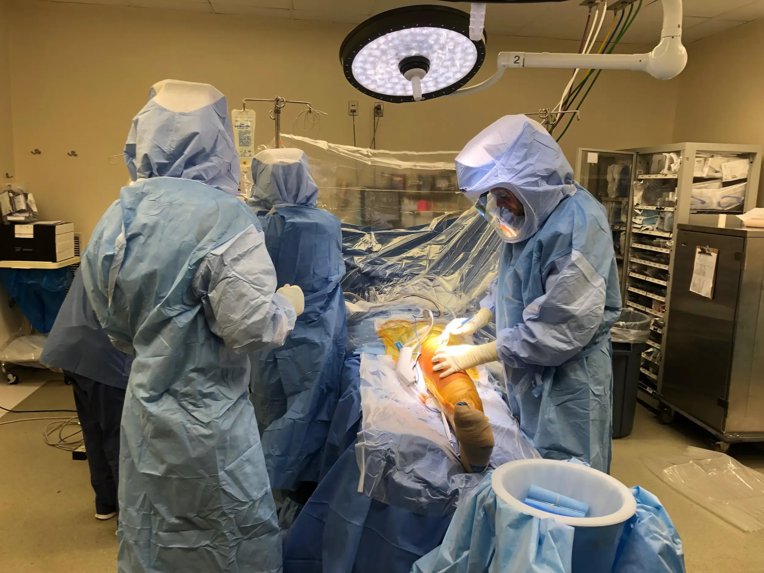 Doctors performing surgery Doctors performing surgery