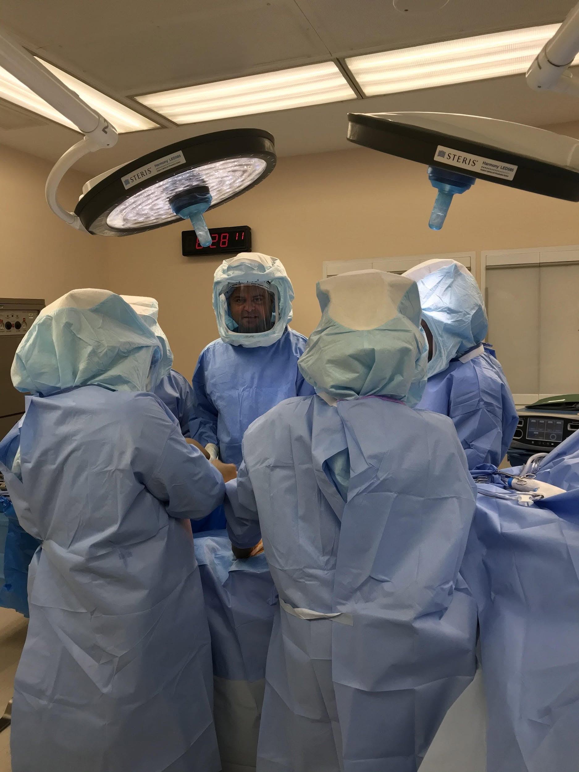 Doctors performing surgery Doctors performing surgery