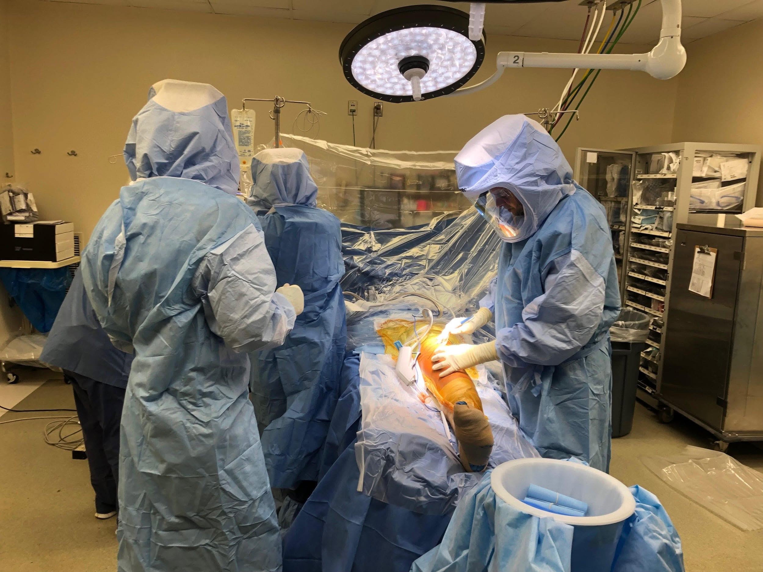 Actual picture of surgeons performing surgery Actual picture of surgeons performing surgery